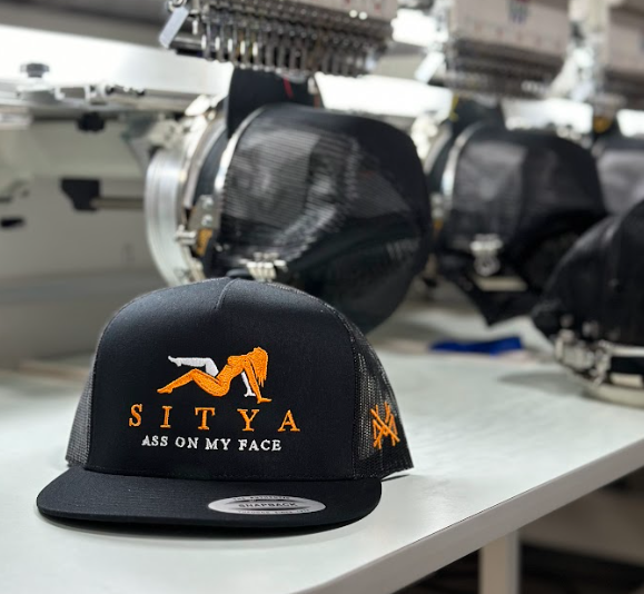 Sitya Trucker Hat: 7 Panel Black